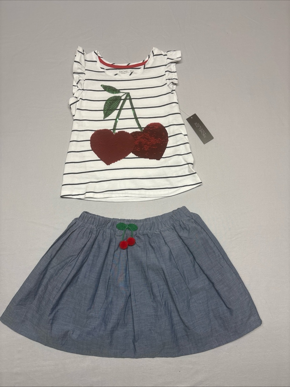 Rachel Zoe White Navy Striped Top with cherry and matching skirt.